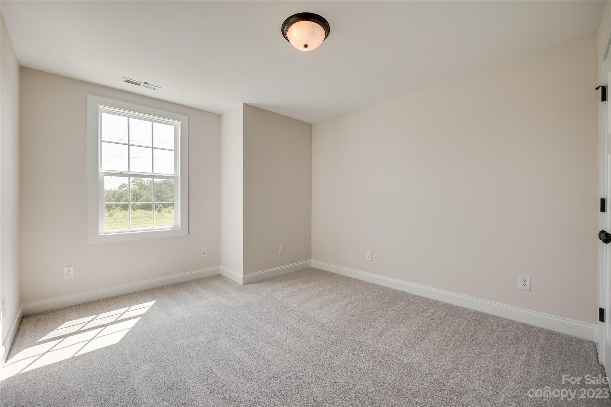2209 State Rd S-46-1474, Unit 14 Clover, SC 29710 - Photo 23 of 33 an empty room with windows