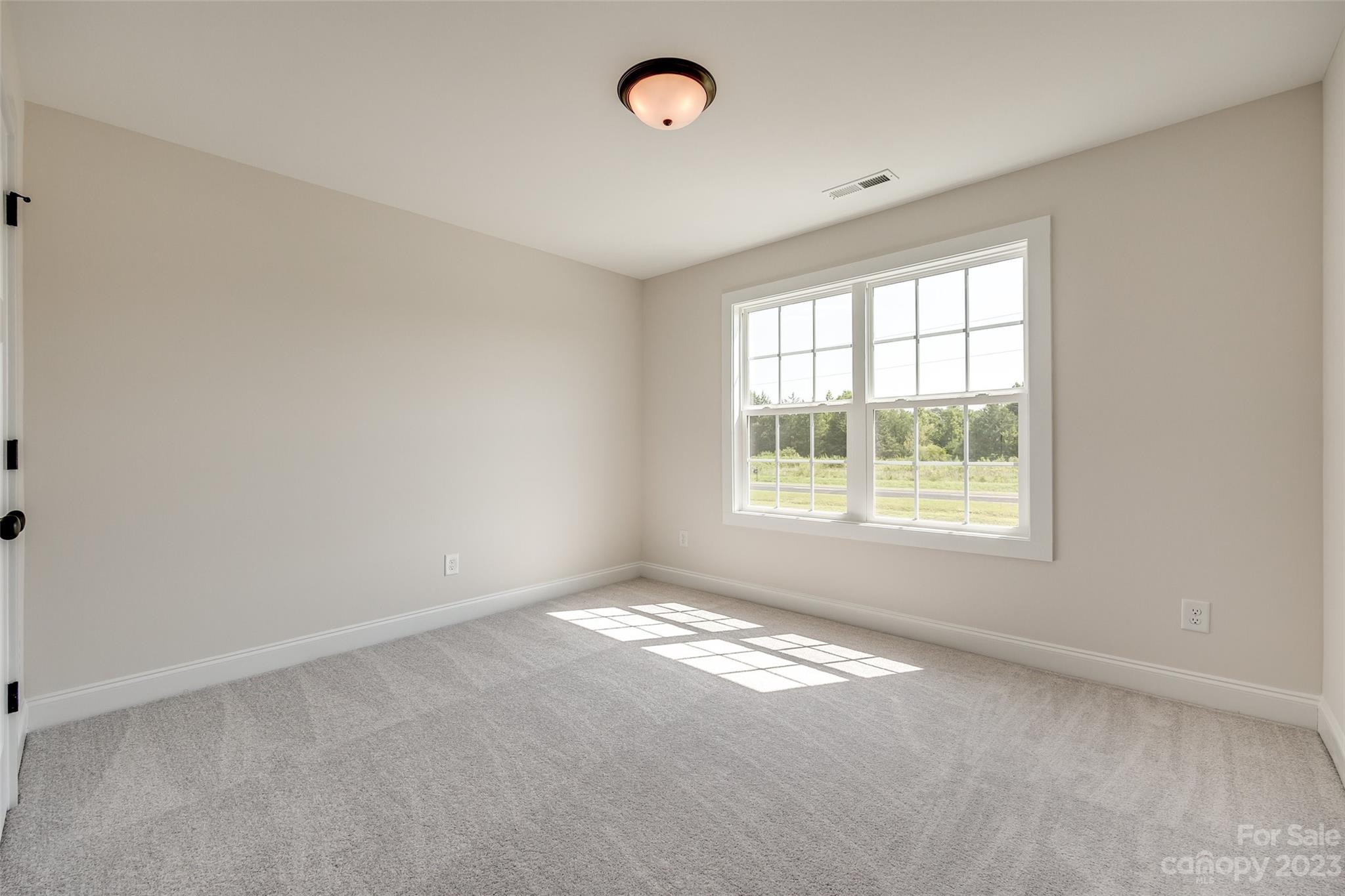 2209 State Rd S-46-1474, Unit 14 Clover, SC 29710 - Photo 25 of 33 a view of an empty room with a window