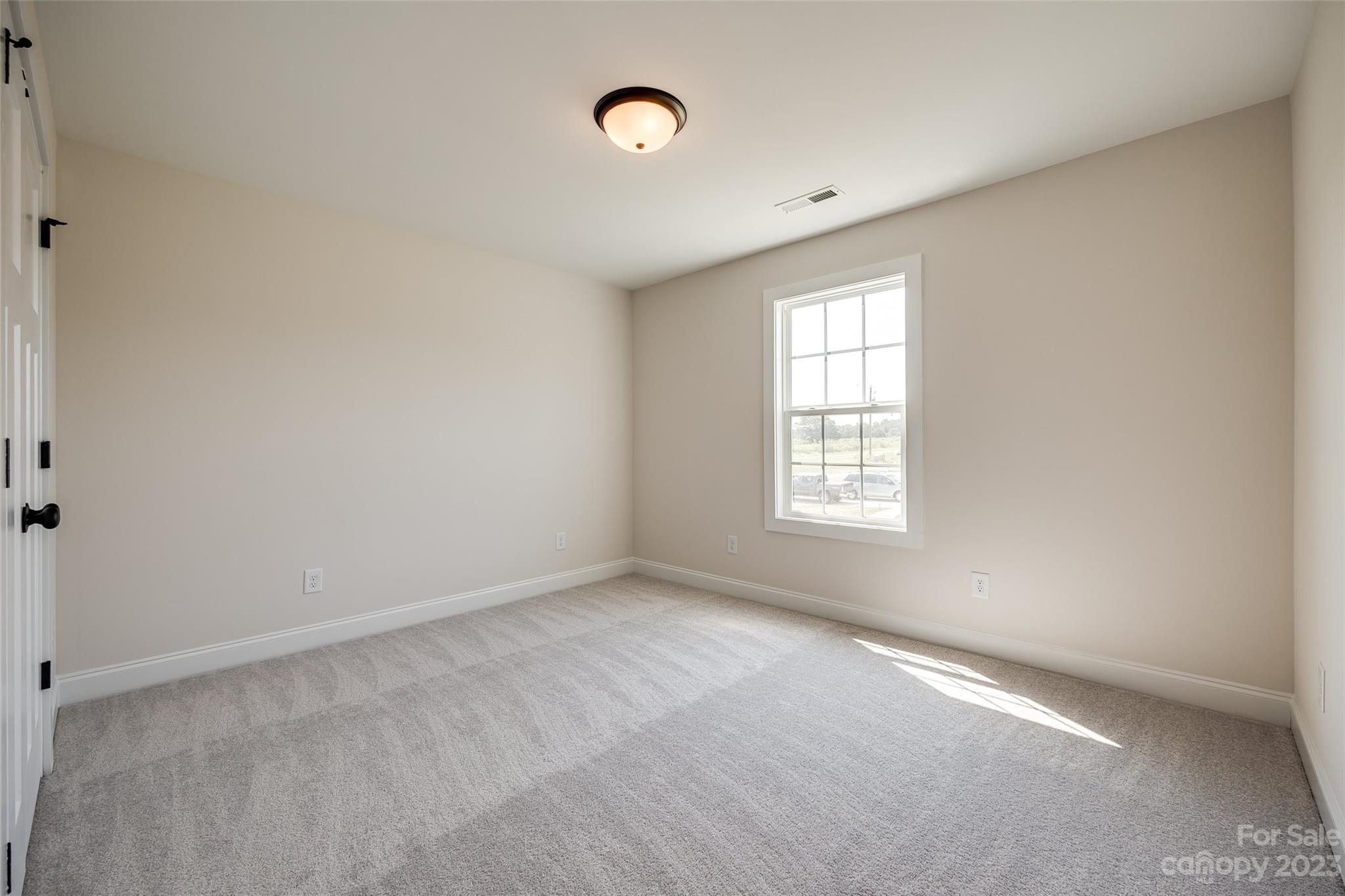 2209 State Rd S-46-1474, Unit 14 Clover, SC 29710 - Photo 28 of 33 a view of an empty room with a window