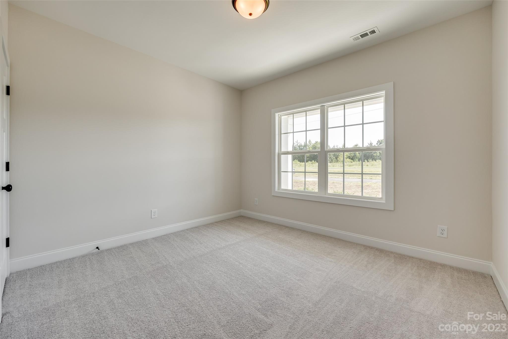 2209 State Rd S-46-1474, Unit 14 Clover, SC 29710 - Photo 4 of 33 an empty room with a window