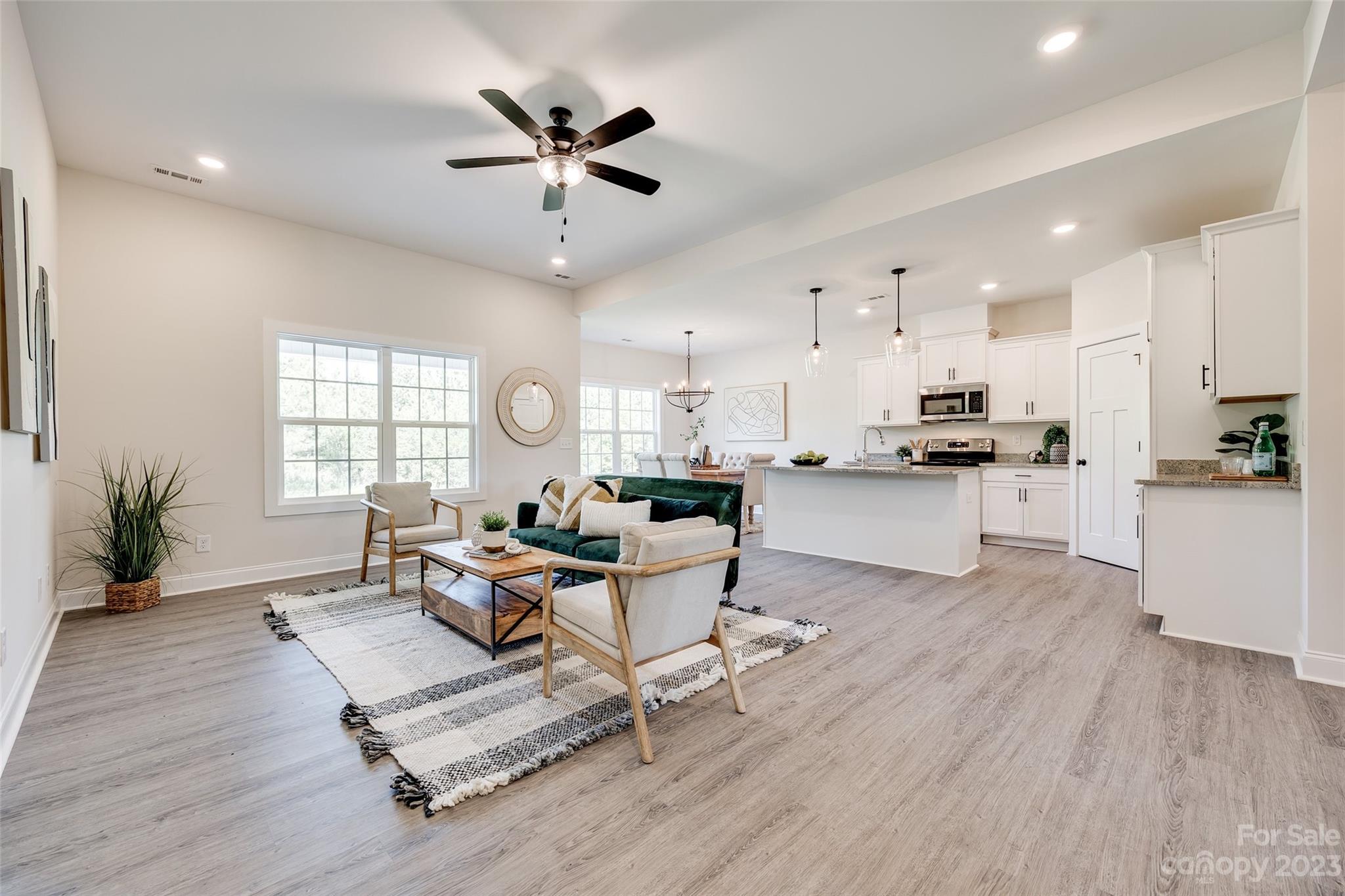 2209 State Rd S-46-1474, Unit 14 Clover, SC 29710 - Photo 8 of 33 a living room with furniture and kitchen view