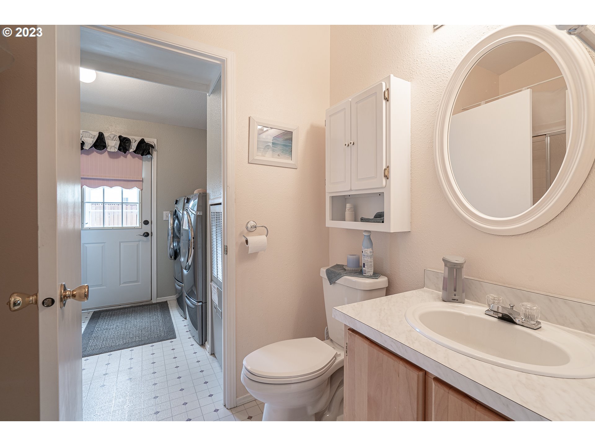 20840 Butteville Road Northeast Donald, OR 97020 - Photo 26 of 40 a bathroom with a toilet sink vanity granite tub and mirror