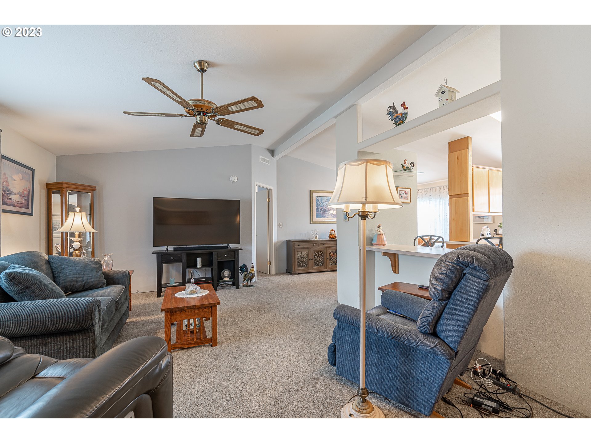20840 Butteville Road Northeast Donald, OR 97020 - Photo 3 of 40 a living room with furniture and a flat screen tv