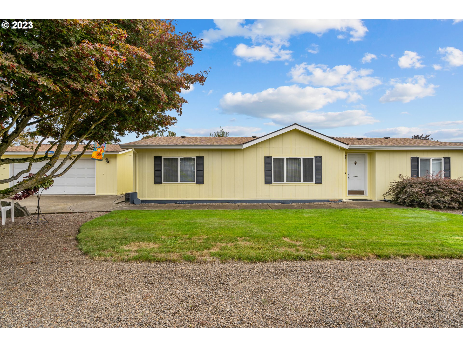 20840 Butteville Road Northeast Donald, OR 97020 - Photo 32 of 40 a view of a yard in front of a house with a large tree