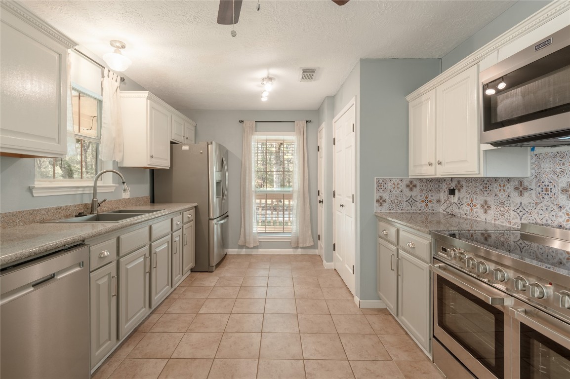 12 Quiet Wind Trinity, TX 75862 - Photo 16 of 48 Beautiful kitchen with lots of workspace for the avid chef.