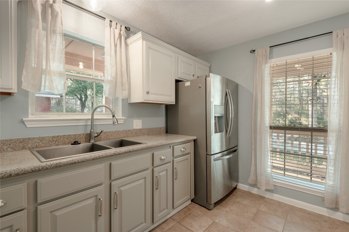 12 Quiet Wind Trinity, TX 75862 - Photo 17 of 48 The refrigerator will remain with the home at the time of sale.