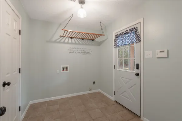 a view of a hallway with elevator