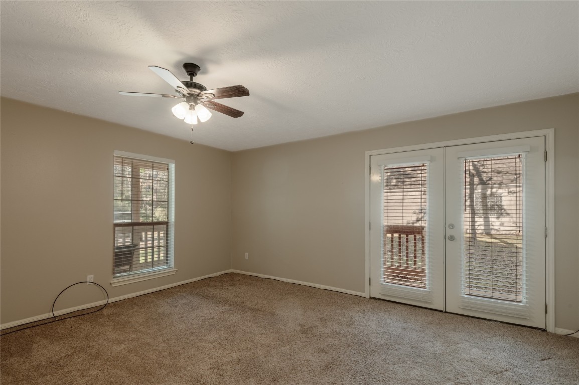 12 Quiet Wind Trinity, TX 75862 - Photo 22 of 48 Primary bedroom as its on exit to the covered wraparound porch.