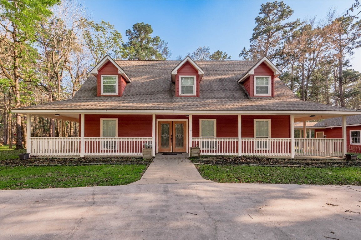 12 Quiet Wind Trinity, TX 75862 - Photo 4 of 48 Front view of this beautiful home and the circle drive.