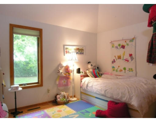 4 Abby Road Barrington, RI 02806 - Photo 11 of 12 a bedroom with a bed and a window