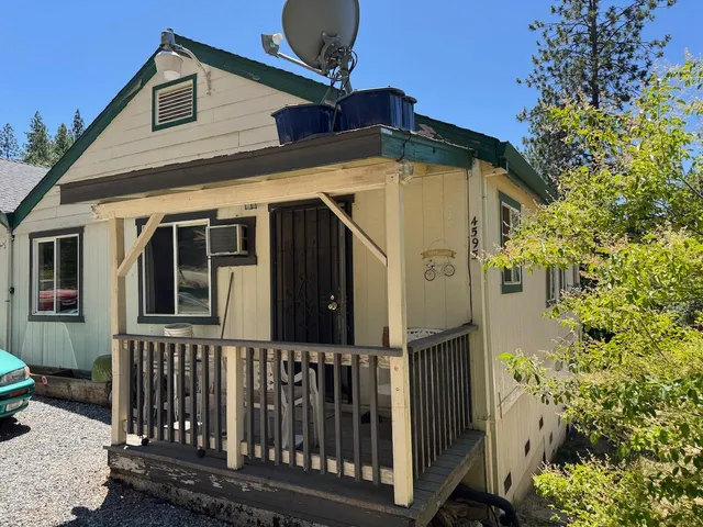 a front view of a house with balcony