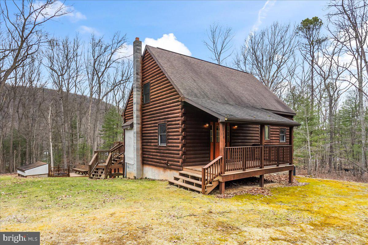 230 Laurel Run Road Dillsburg, PA 17019 - Photo 1 of 36 a view of a house with a backyard and wooden fence