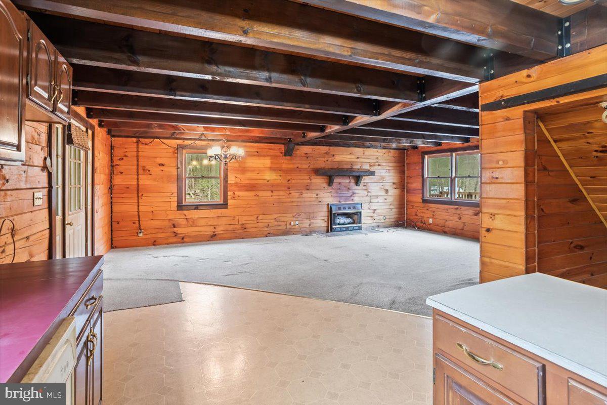 230 Laurel Run Road Dillsburg, PA 17019 - Photo 11 of 36 a view of an empty room with wooden floor and windows