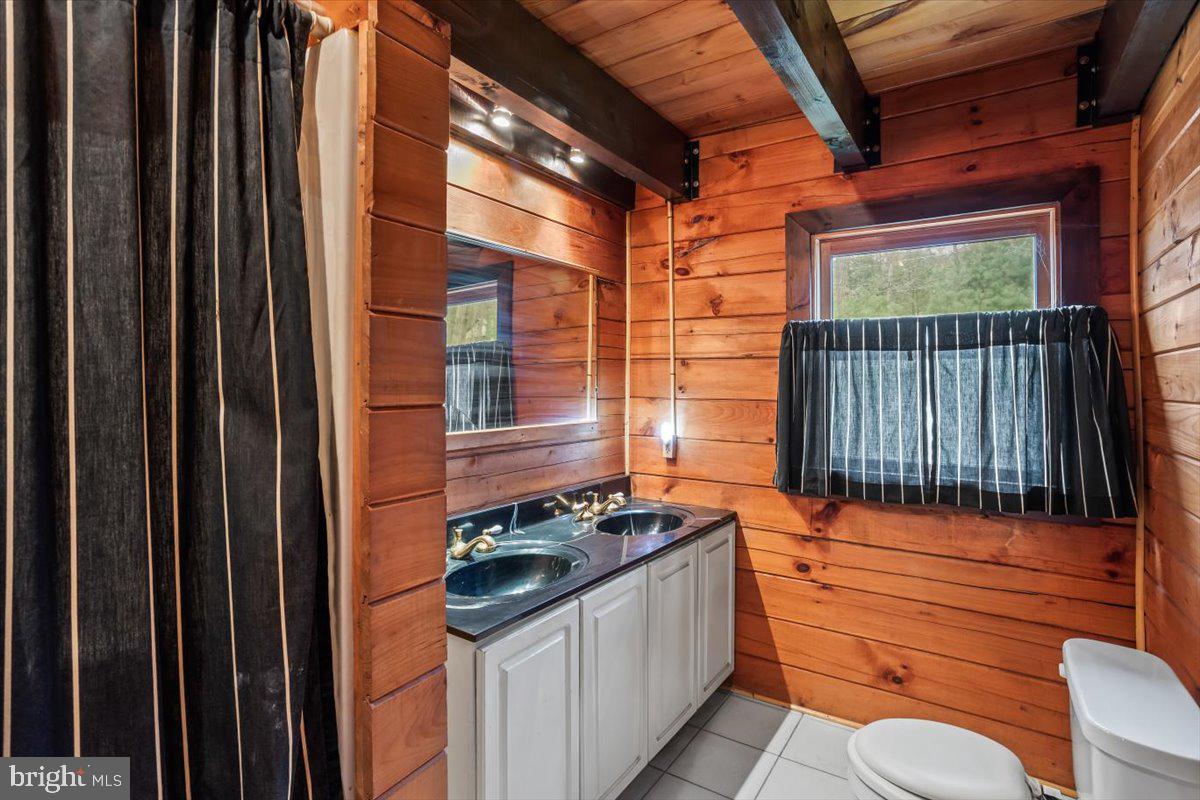 230 Laurel Run Road Dillsburg, PA 17019 - Photo 14 of 36 a room with furniture and window