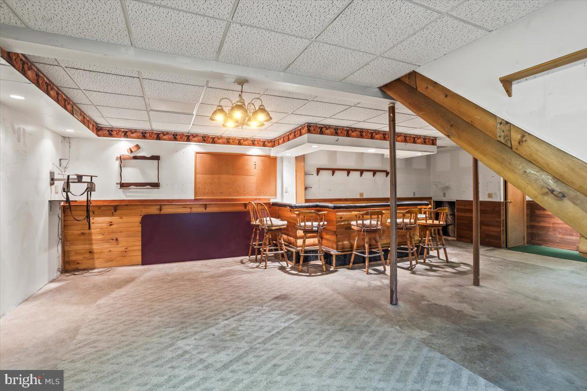 230 Laurel Run Road Dillsburg, PA 17019 - Photo 20 of 36 a room with lots of wooden furniture and chairs