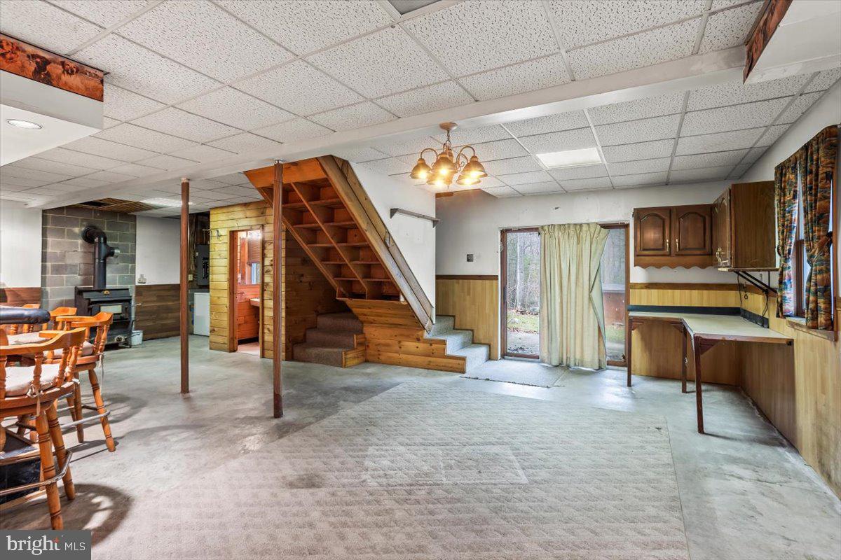 230 Laurel Run Road Dillsburg, PA 17019 - Photo 21 of 36 a view of an empty room with wooden floor and furniture