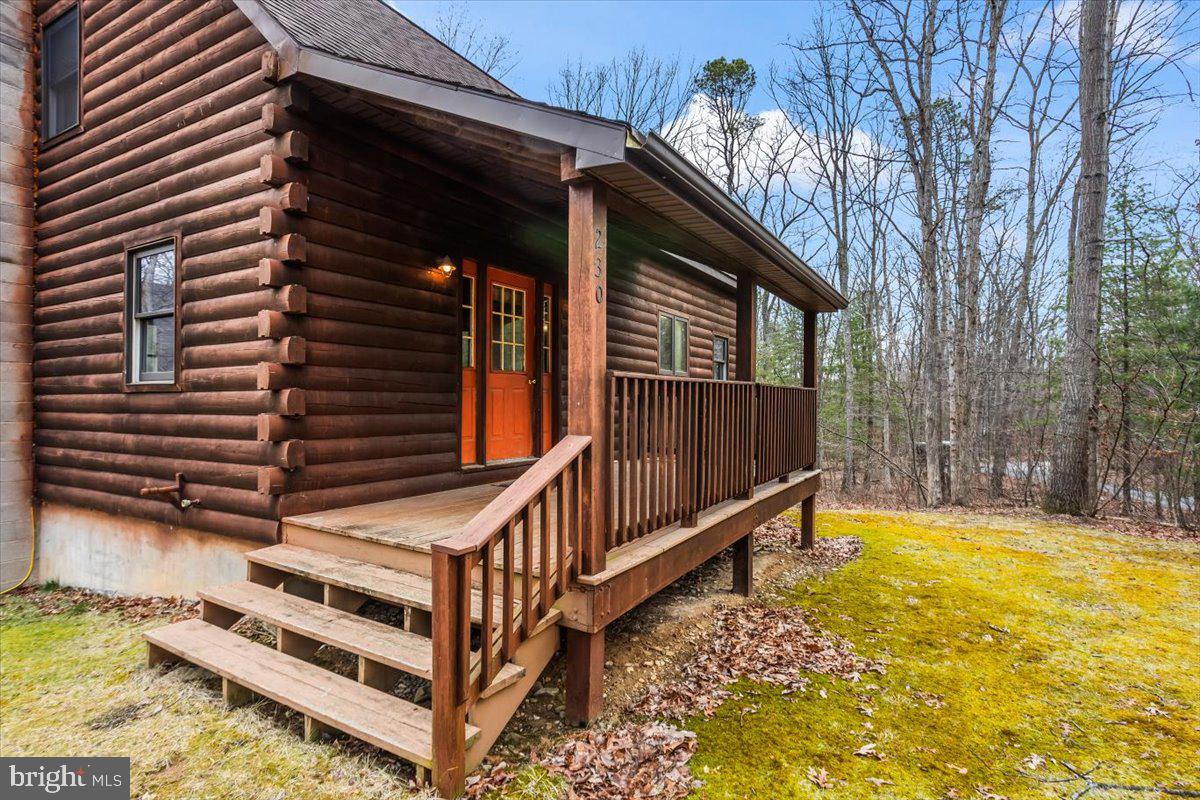 230 Laurel Run Road Dillsburg, PA 17019 - Photo 4 of 36 a view of a house with backyard and deck