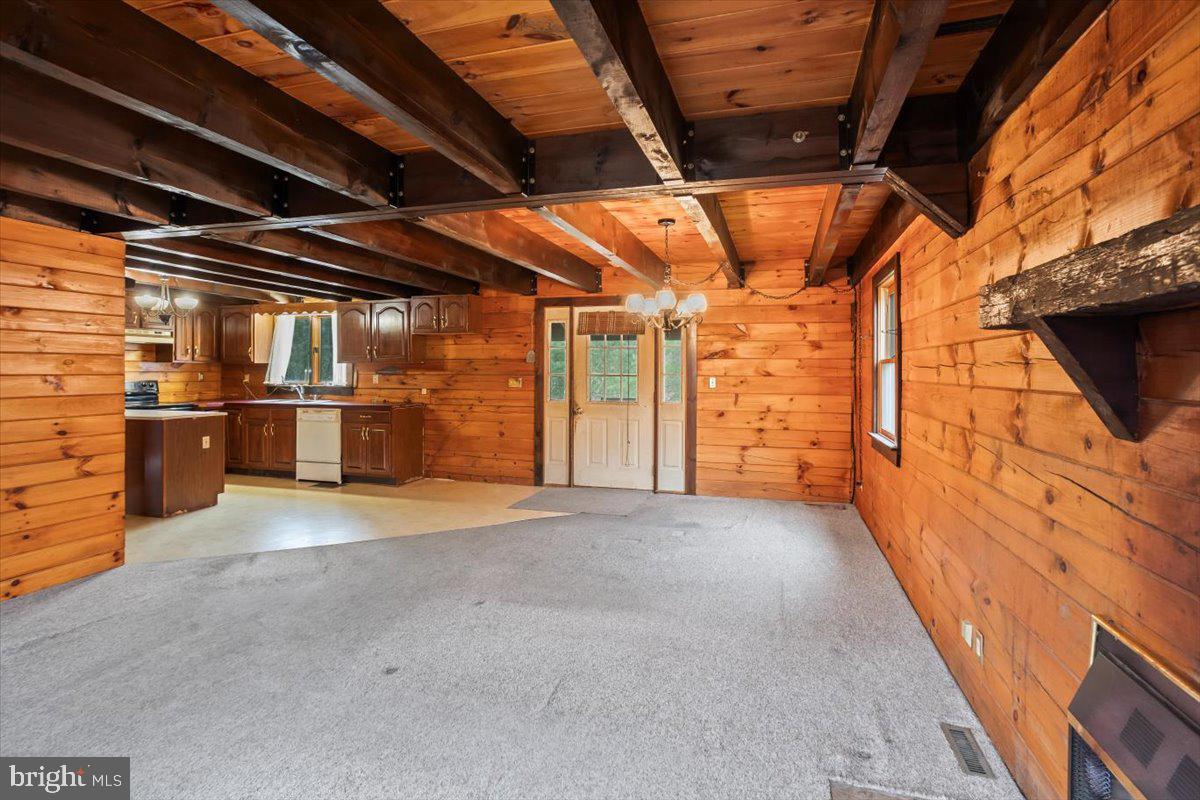 230 Laurel Run Road Dillsburg, PA 17019 - Photo 6 of 36 a view of empty room with wooden walls