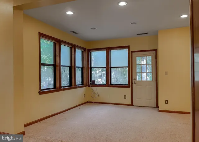 an empty room with windows