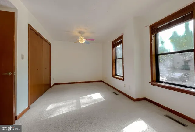 an empty room with windows