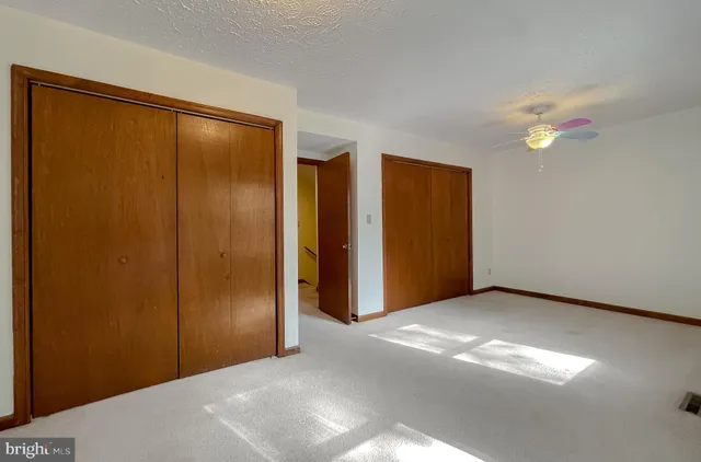 a view of a room with a large window