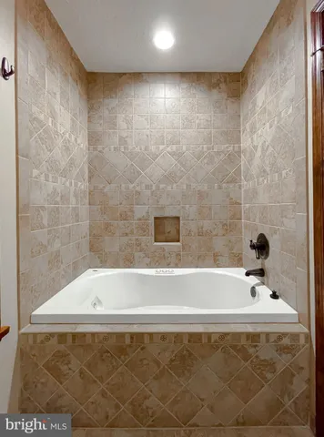 a bathroom with a bathtub