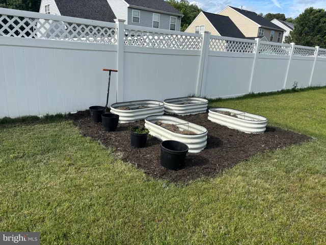 a bathroom with a toilet a sink and a mirror