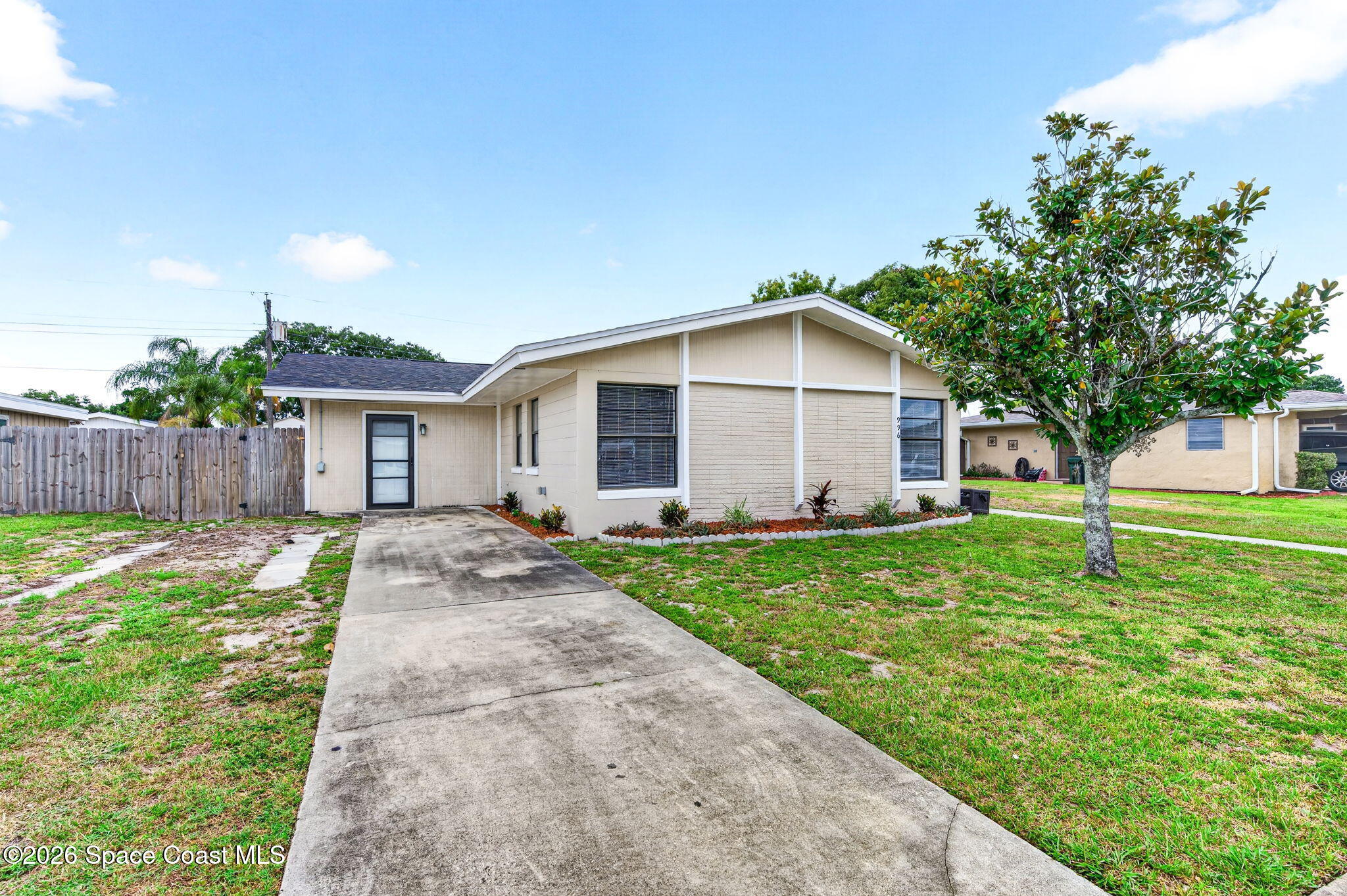 996 Botany Lane Rockledge, FL 32955 - Photo 2 of 35 a view of a house with a yard