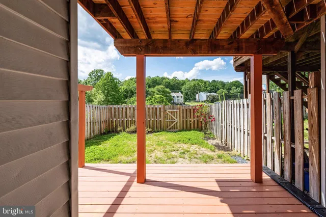 a room with a sink and cabinets
