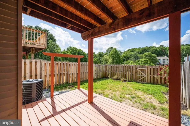 a view of backyard with green space