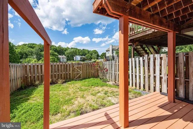 a view of a backyard with a trees
