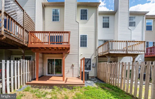 a front view of a house with a porch