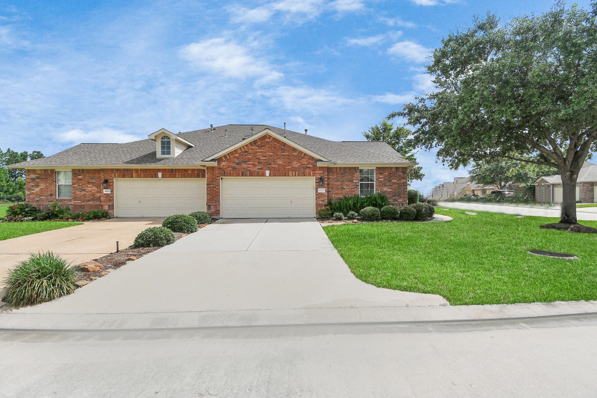 8624 Sunset Loch Drive Spring, TX 77379 - Photo 37 of 44 front view of a house with a yard