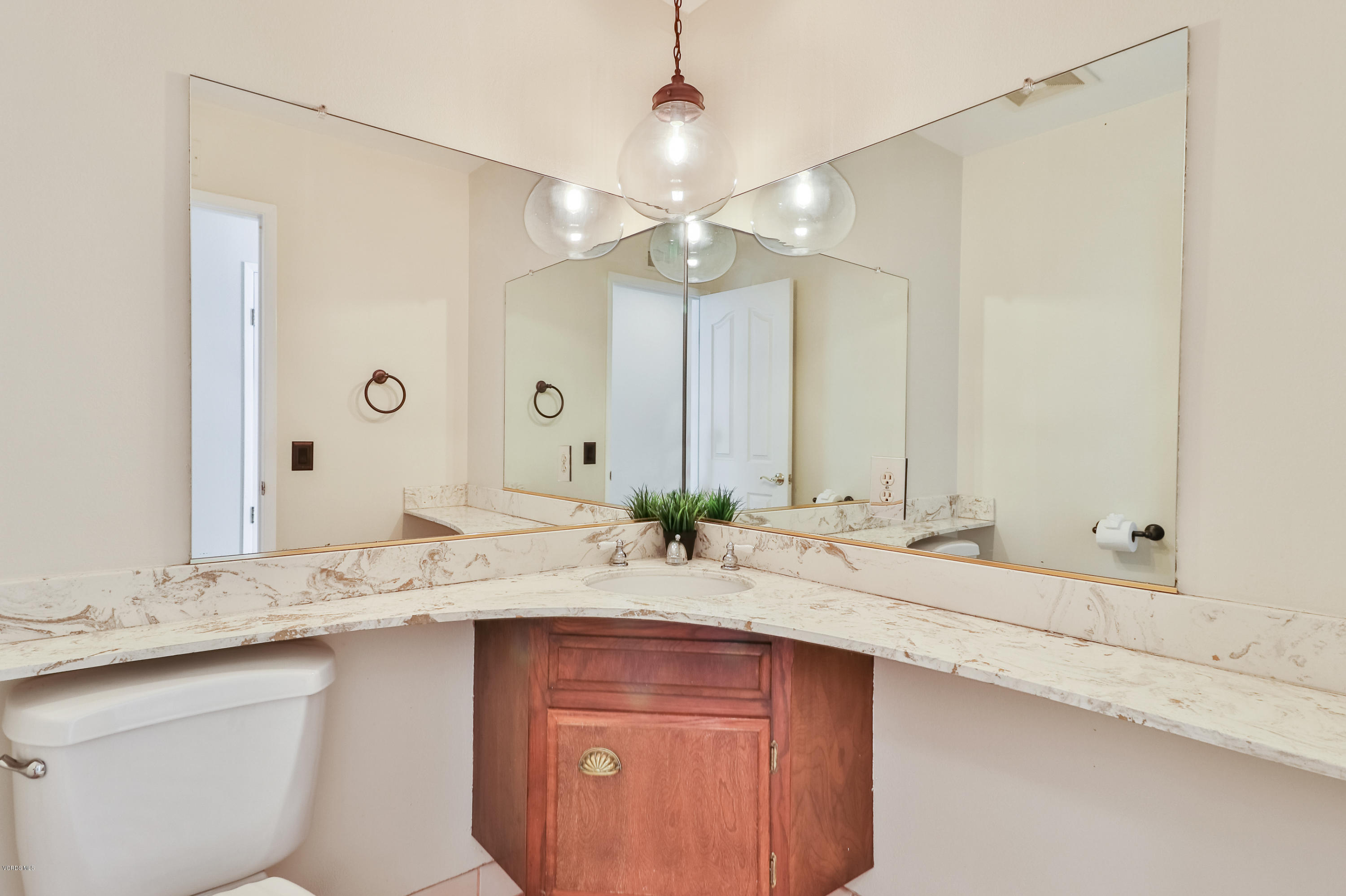 3131 Springfield Street Simi Valley, CA 93063 - Photo 14 of 38 a bathroom with a sink and a mirror