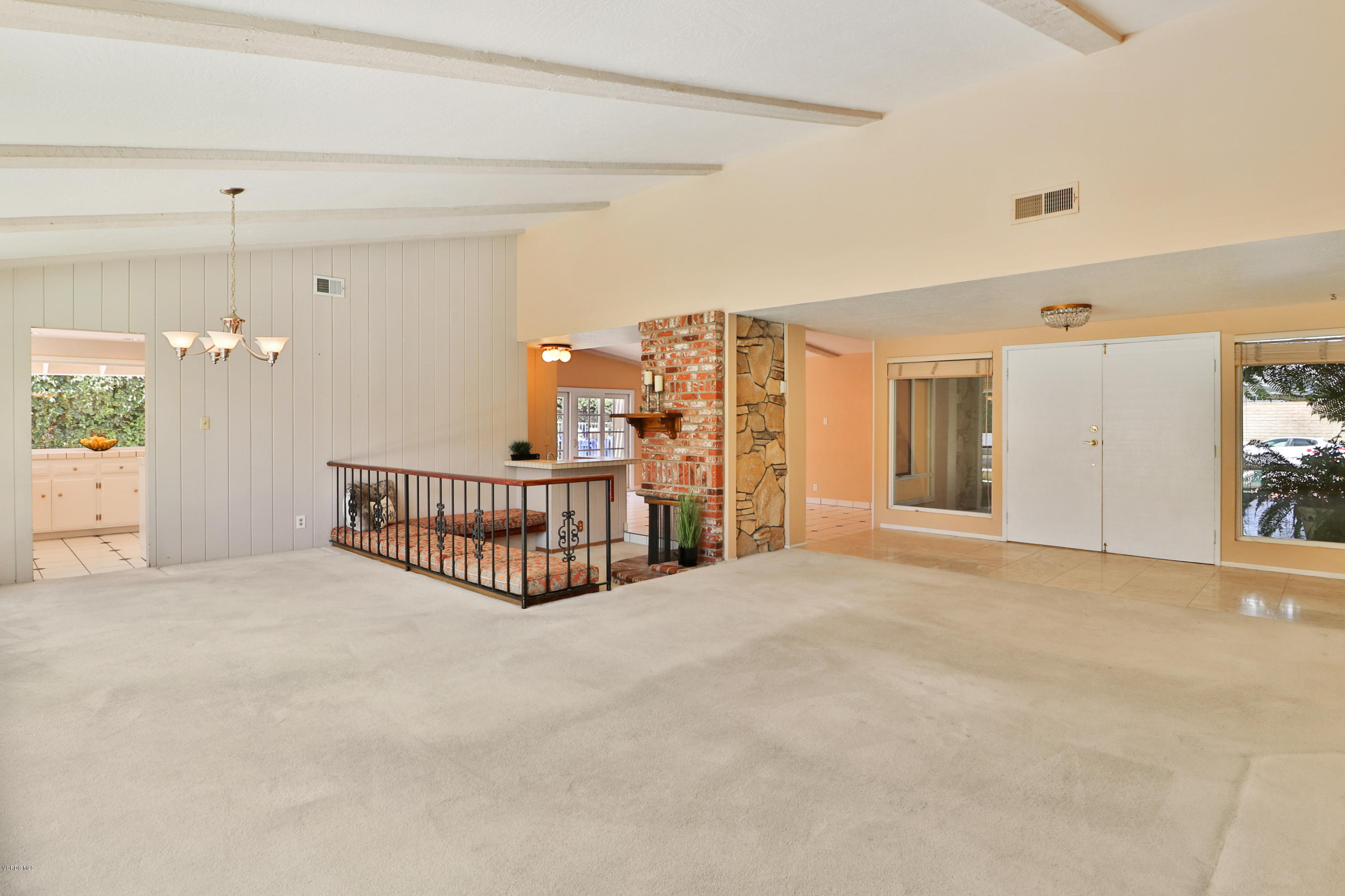 3131 Springfield Street Simi Valley, CA 93063 - Photo 5 of 38 a view of a hallway with a livingroom and chandelier