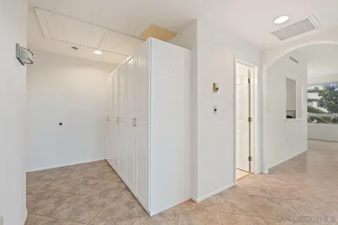 a view of a bathroom with a shower and a sink