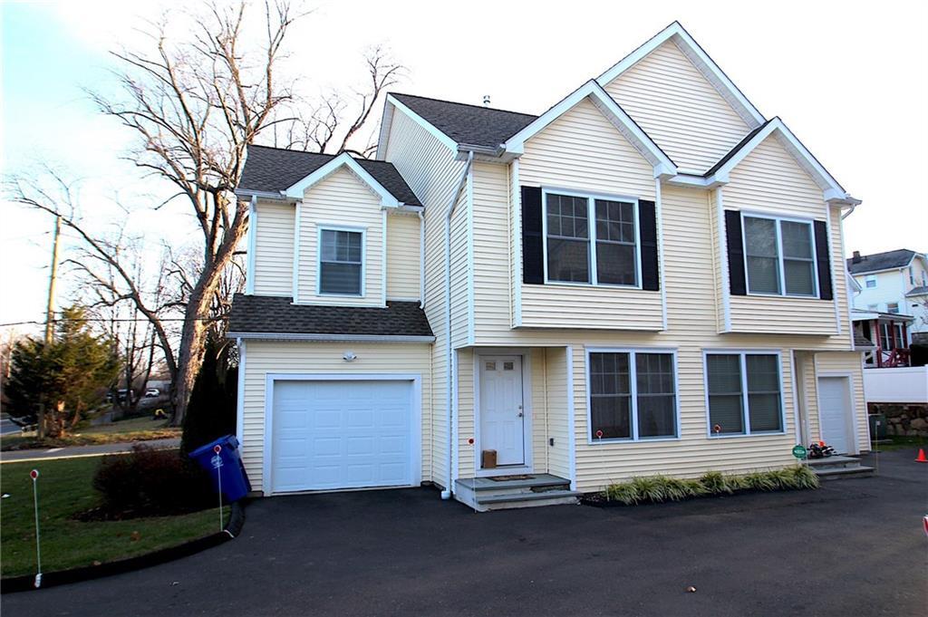 57a Riverside Avenue, Unit B Norwalk, CT 06850 - Photo 1 of 1 a front view of a house with a yard