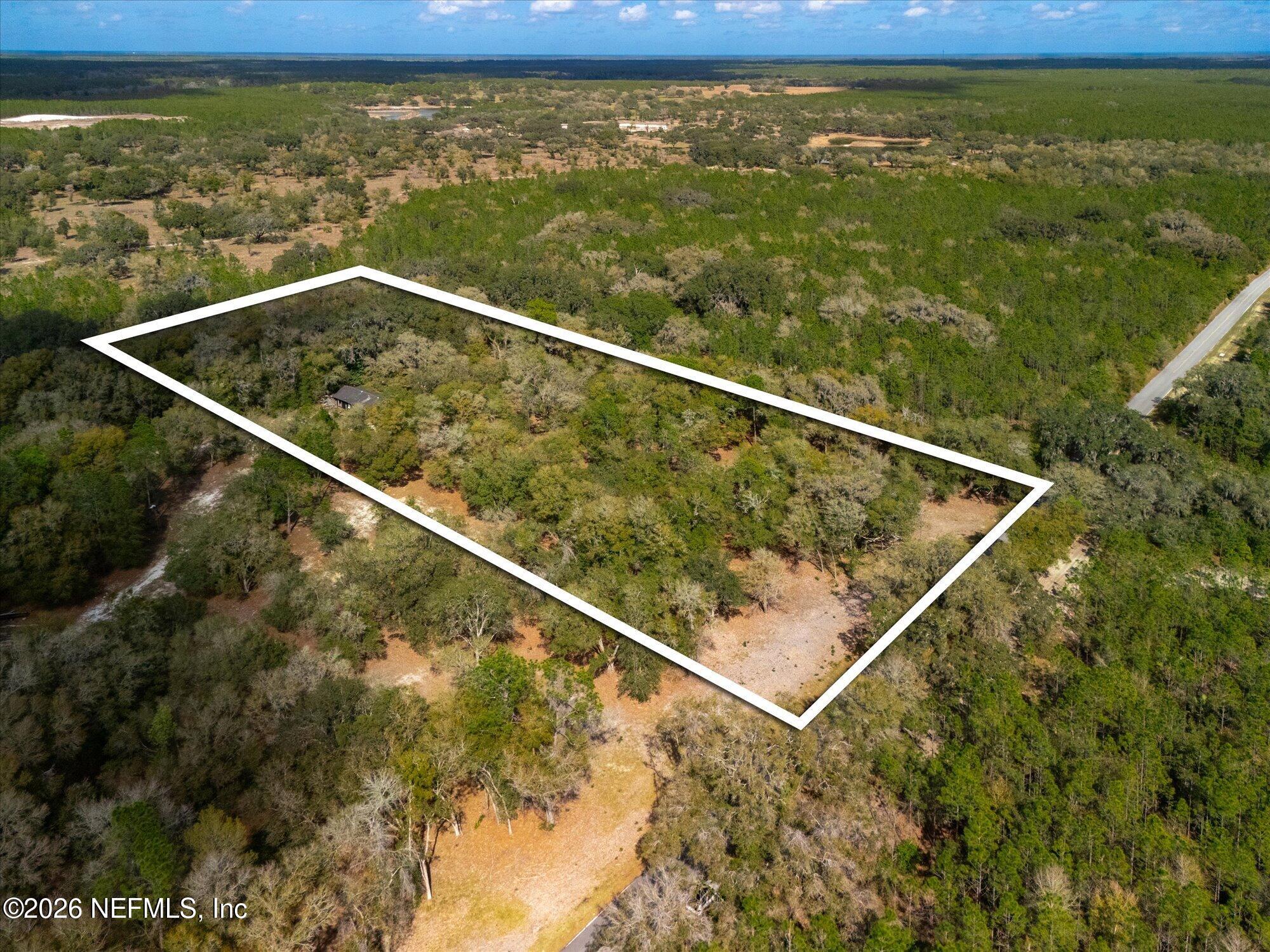 660 Old Welaka Road Satsuma, FL 32189 - Photo 20 of 28 a view of a two chair in the balcony
