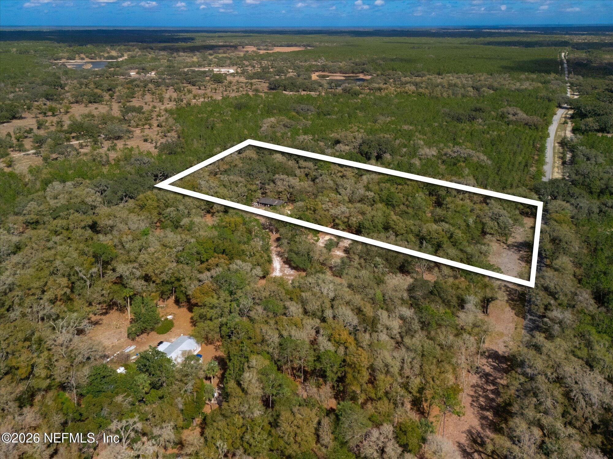 660 Old Welaka Road Satsuma, FL 32189 - Photo 21 of 28 a view of a lake from a balcony