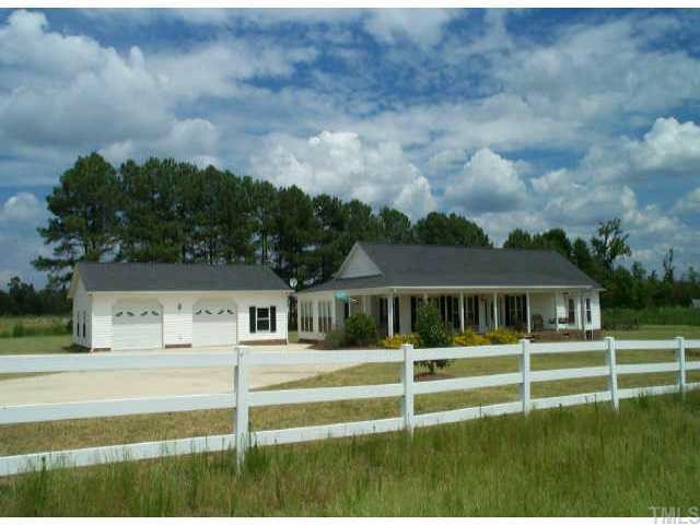 7616 Elevation Road Benson, NC 27504 - Photo 1 of 1 a view of house with a big yard
