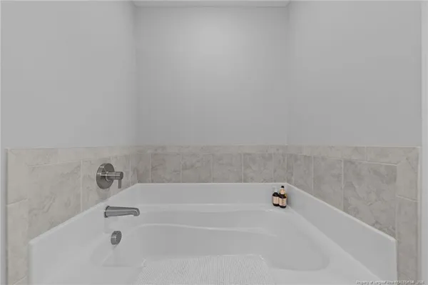 a bathroom with bathtub
