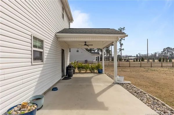 a view of a terrace with chairs