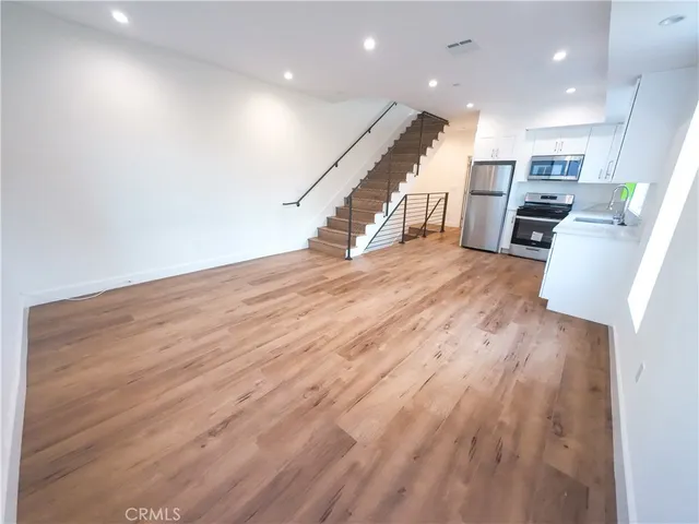 wooden floor and an empty room with wooden floor
