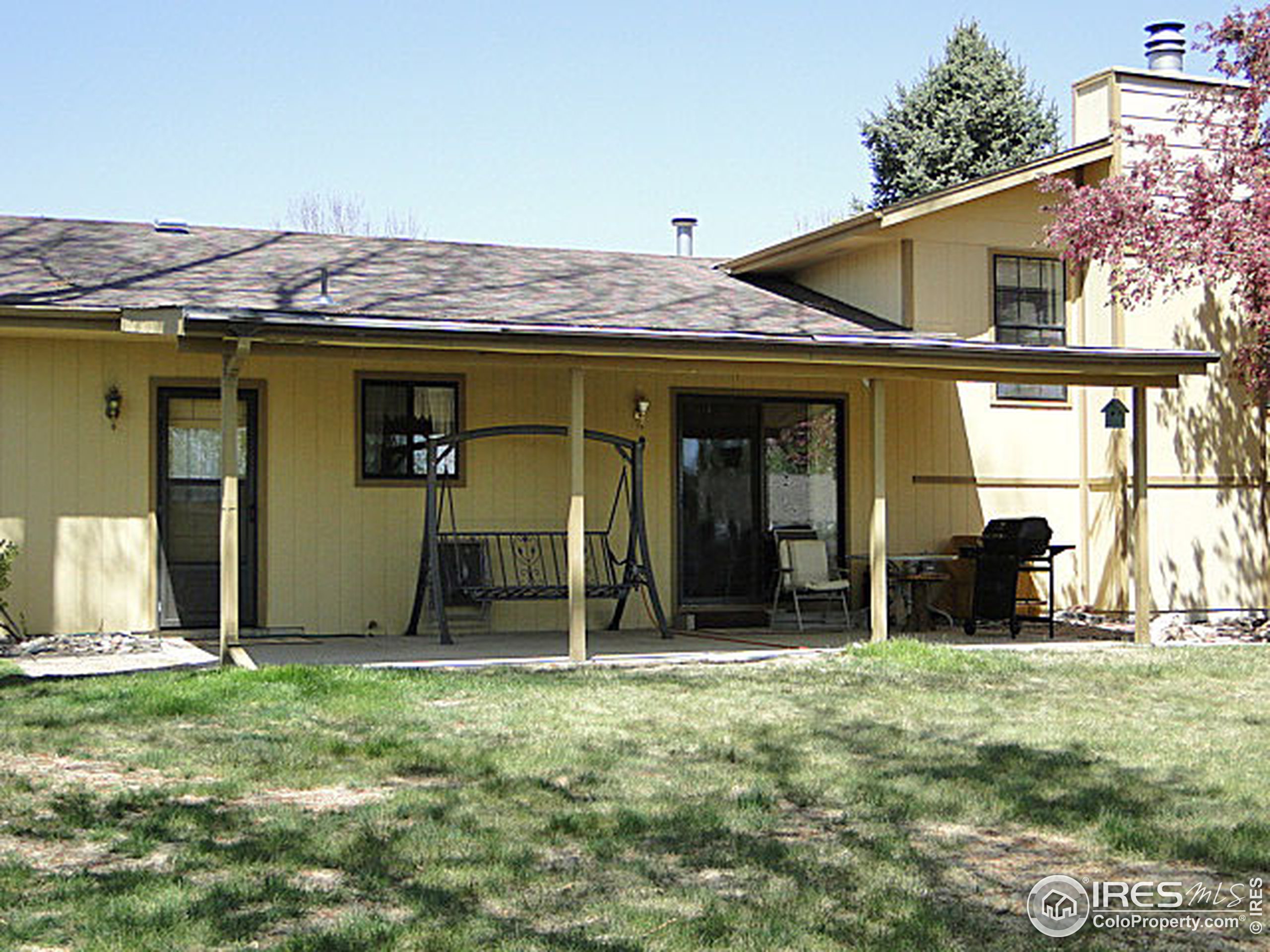3334 34th Street Greeley, CO 80634 - Photo 22 of 25 a view of a house with yard
