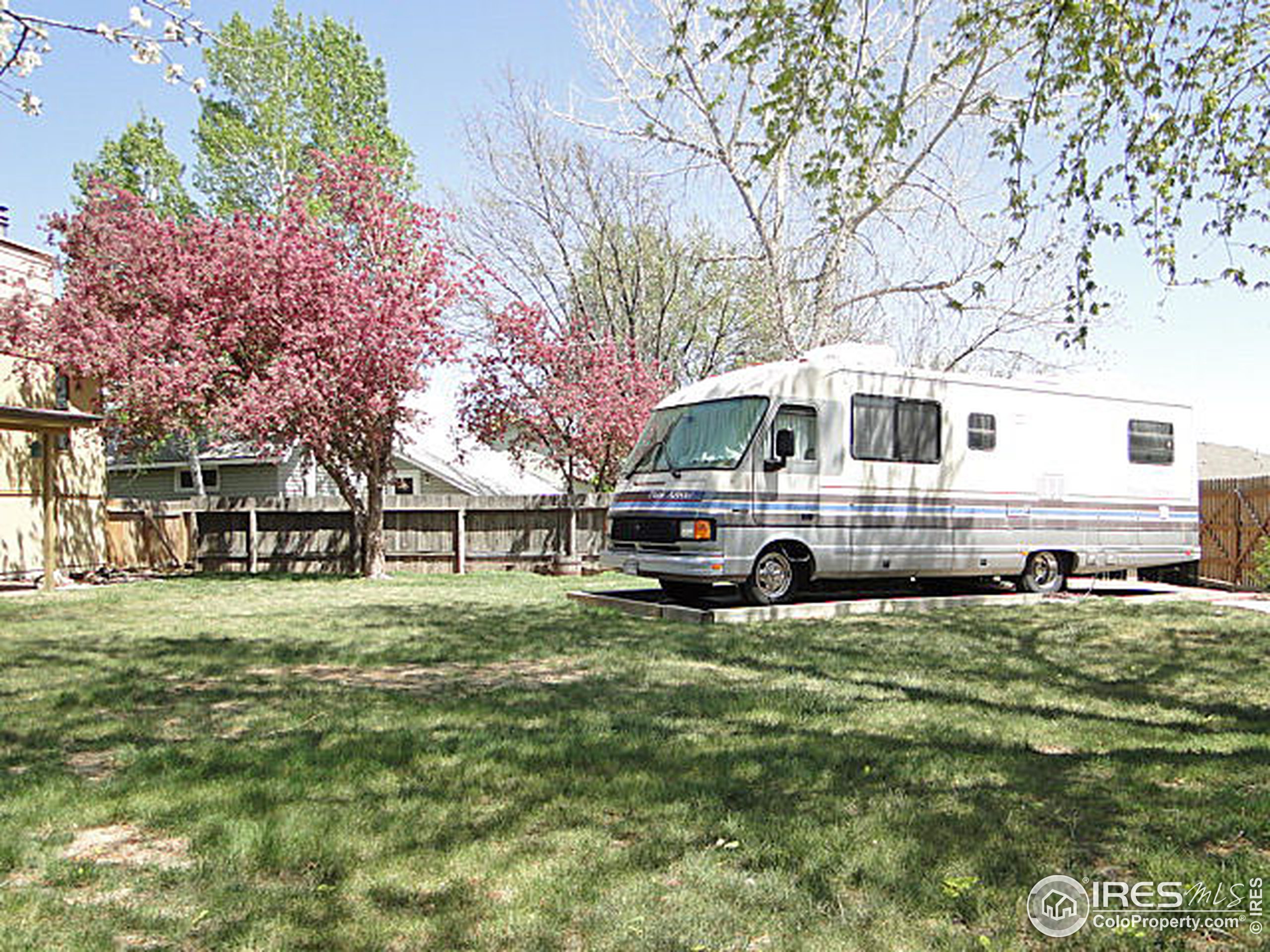 3334 34th Street Greeley, CO 80634 - Photo 25 of 25 a car parked in front of white house