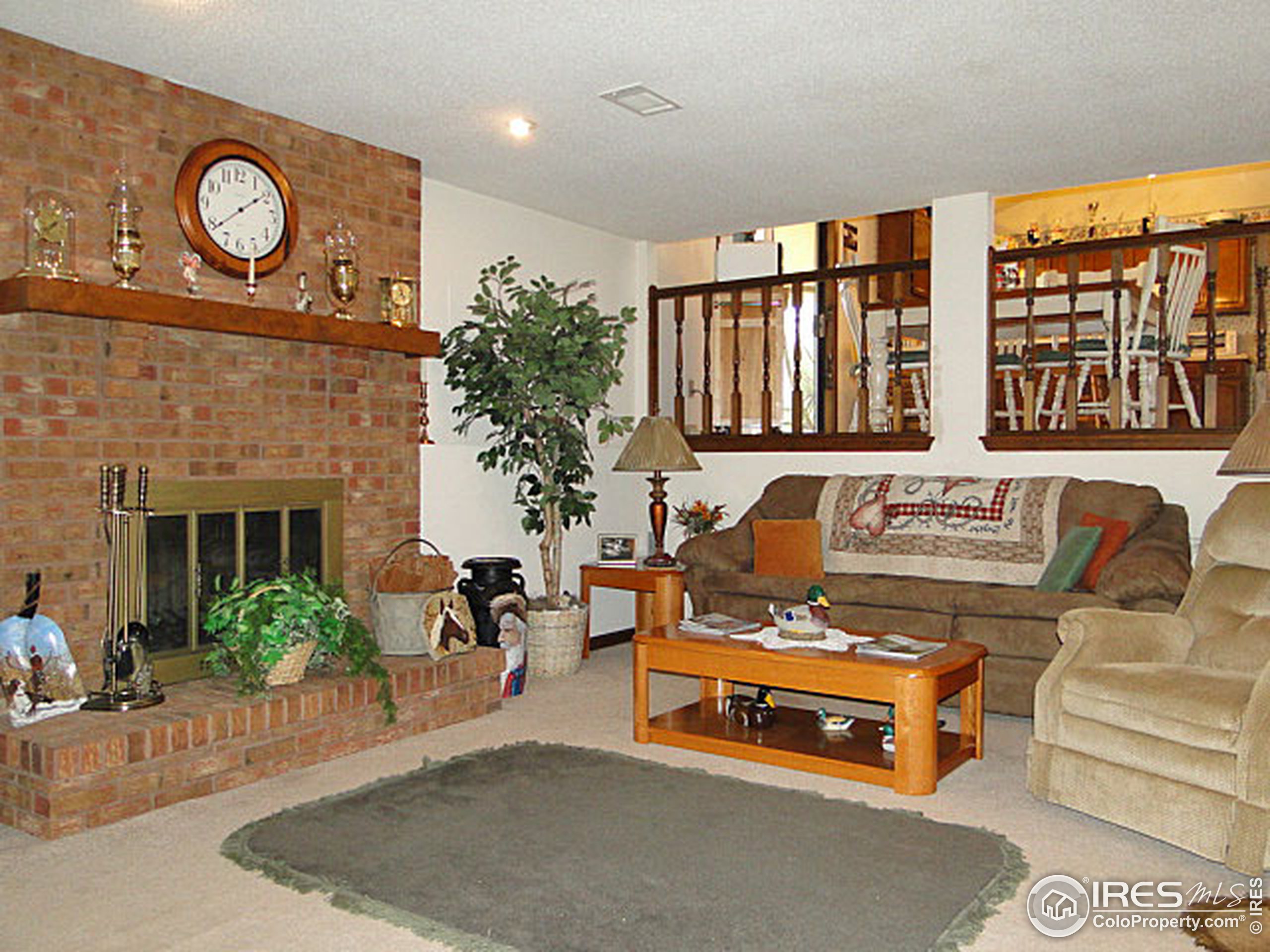 3334 34th Street Greeley, CO 80634 - Photo 4 of 25 a living room with furniture