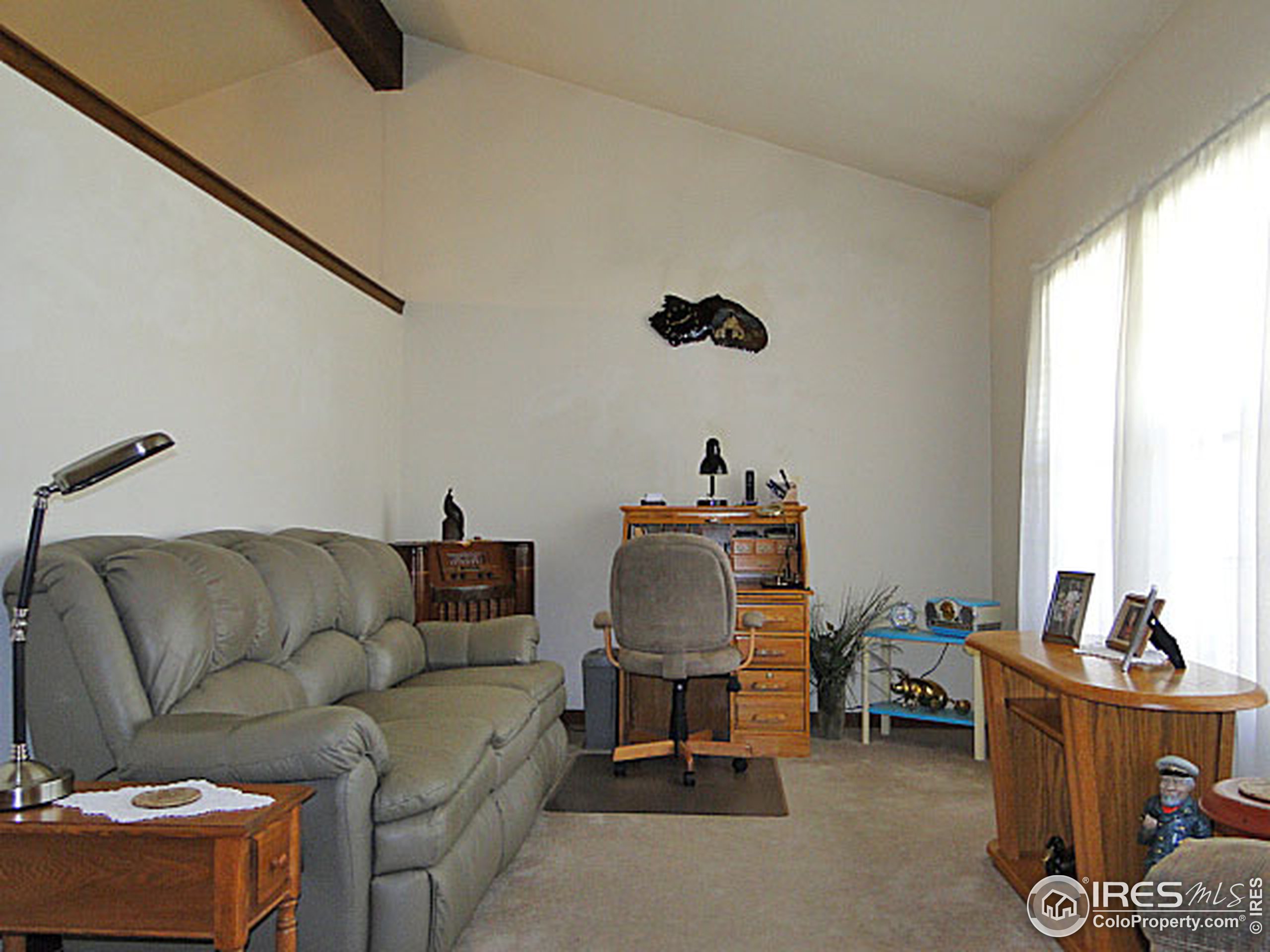 3334 34th Street Greeley, CO 80634 - Photo 5 of 25 a living room with furniture