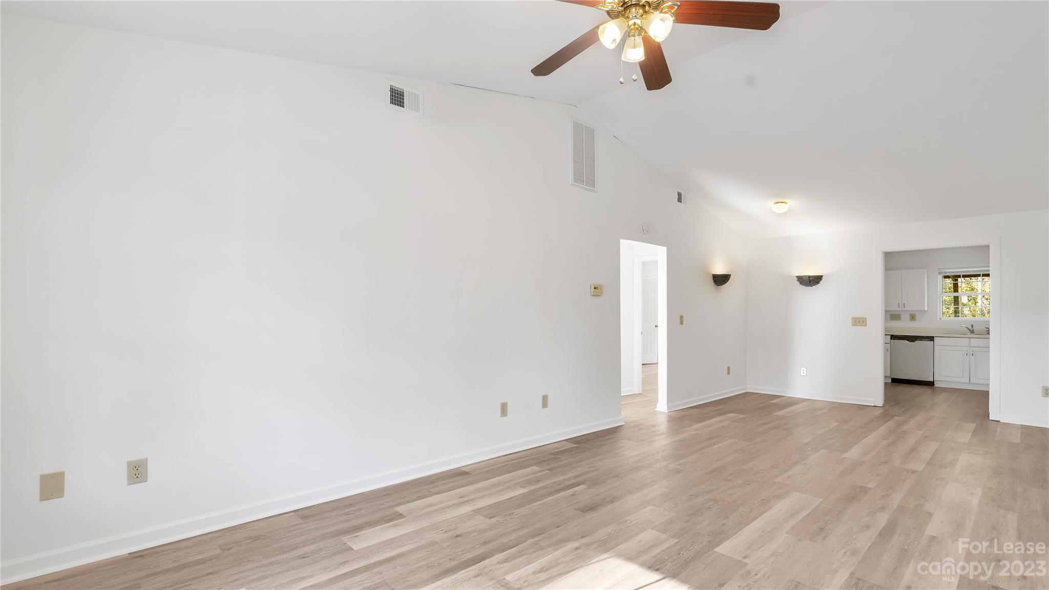 3733 Oakwood Road, Unit A Charlotte, NC 28269 - Photo 2 of 15 a view of empty room with wooden floor