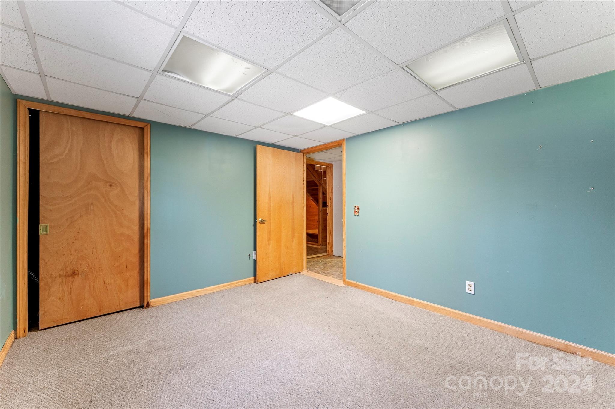 616 Oak Grove Road Flat Rock, NC 28731 - Photo 27 of 36 an empty room with a natural light