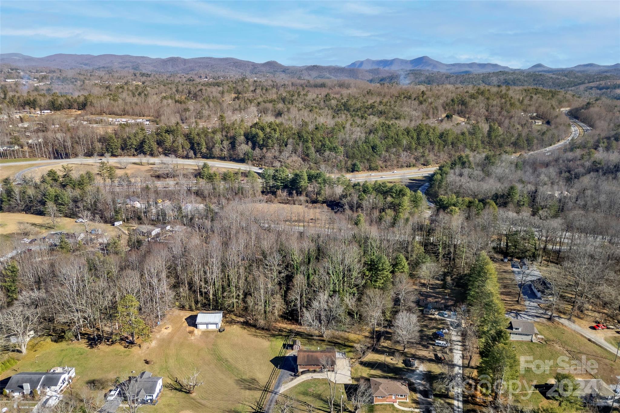616 Oak Grove Road Flat Rock, NC 28731 - Photo 34 of 36 an aerial view of residential house with outdoor space